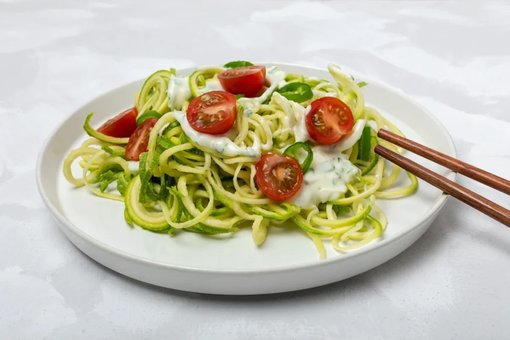 Zucchini Noodles with Pesto and Cherry Tomatoes